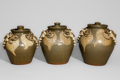 Exceptional Graduated Set of Alkaline-Glazed Lidded Stoneware Jars w/ Grapes Motifs, Signed "Lanier Meaders"