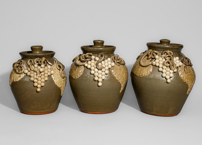 Exceptional Graduated Set of Alkaline-Glazed Lidded Stoneware Jars w/ Grapes Motifs, Signed "Lanier Meaders"