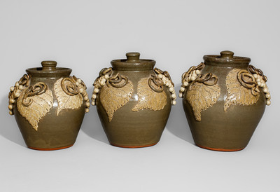 Exceptional Graduated Set of Alkaline-Glazed Lidded Stoneware Jars w/ Grapes Motifs, Signed "Lanier Meaders"