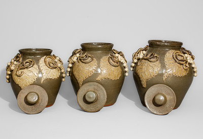 Exceptional Graduated Set of Alkaline-Glazed Lidded Stoneware Jars w/ Grapes Motifs, Signed "Lanier Meaders"