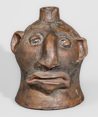 Very Rare Albany-Slip-Decorated Stoneware Face Jug, attrib. Charles P. Ferguson, Barrow County, Georgia