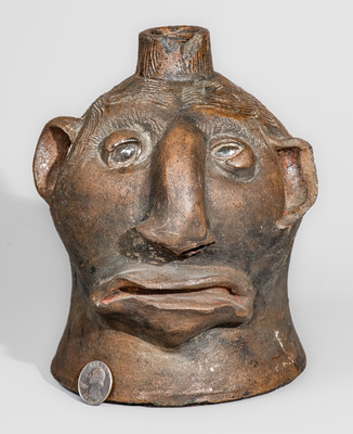 Very Rare Albany-Slip-Decorated Stoneware Face Jug, attrib. Charles P. Ferguson, Barrow County, Georgia