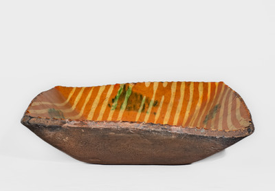 Large-Sized Philadelphia, PA Redware Loaf Dish w/ Two-Color Slip Decoration, late 18th century