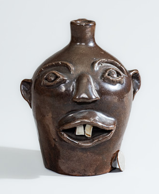 BROWN POTTERY (Arden, NC) Albany-Slip-Glazed Stoneware Face Jug, circa 1930