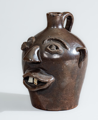 BROWN POTTERY (Arden, NC) Albany-Slip-Glazed Stoneware Face Jug, circa 1930