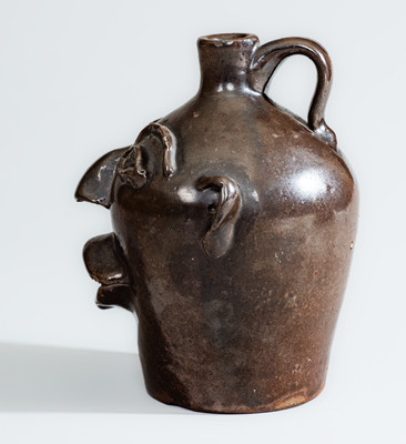 BROWN POTTERY (Arden, NC) Albany-Slip-Glazed Stoneware Face Jug, circa 1930