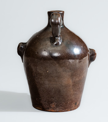 BROWN POTTERY (Arden, NC) Albany-Slip-Glazed Stoneware Face Jug, circa 1930