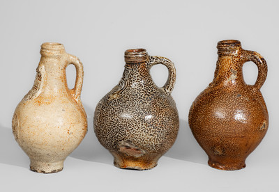 Three Bellarmine Stoneware Jugs, probably Frechen, Germany, 16th or 17th century