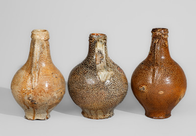 Three Bellarmine Stoneware Jugs, probably Frechen, Germany, 16th or 17th century