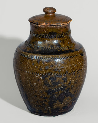 Unusual Manganese-Decorated Redware Jar w/ Lid, probably North Carolina, 19th century