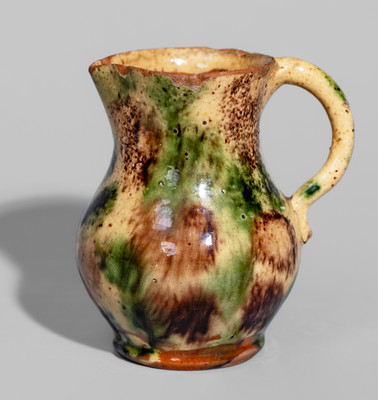 Rare and Fine Diminutive Redware Pitcher w/ Three-Color Slip Decoration, possibly Salem, NC, late 18th century