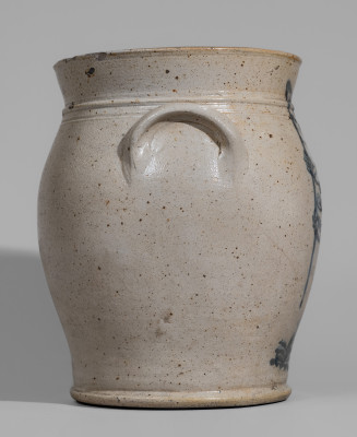 Exceptional Patriotic Stoneware Jar Bearing an Elaborate Decoration of a Man Carrying an American Flag