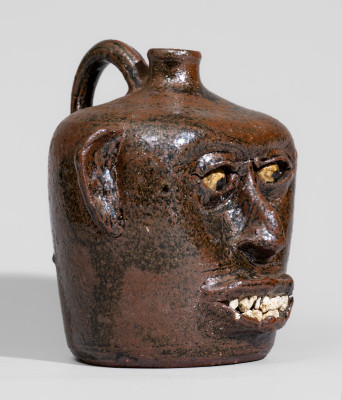 Rare Alkaline-Glazed Stoneware Face Jug with Rock Teeth, Signed 