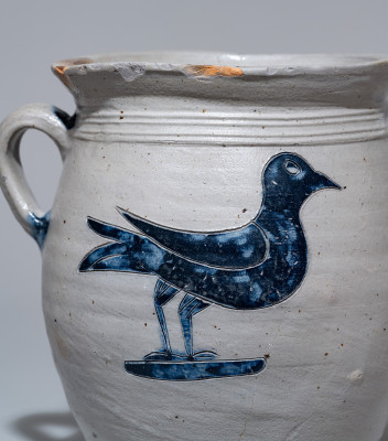 Extremely Rare Vertical-Handled Stoneware Jar with Two-Sided Incised Bird Decoration, Manhattan, NY origin, probably Crolius Family, late 18th century.