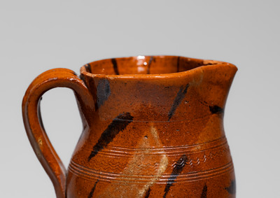 Exceptional attrib. Cain Pottery, Sullivan Co, TN Redware Pitcher w/ Profuse Manganese and Yellow Slip Slash Decoration