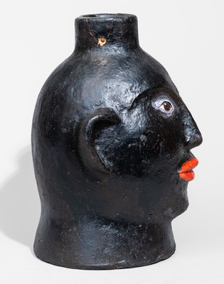 Rare Painted Woman Face Jug, possibly North Carolina origin, 20th century
