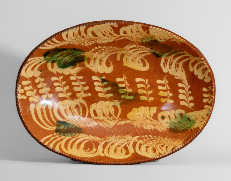 Exceptional Philadelphia Redware Platter w/ Elaborate Yellow and Green Slip Decoration, 18th century