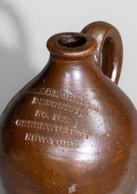 Small-Sized New York City Druggist's Advertising Jug, second quarter 19th century