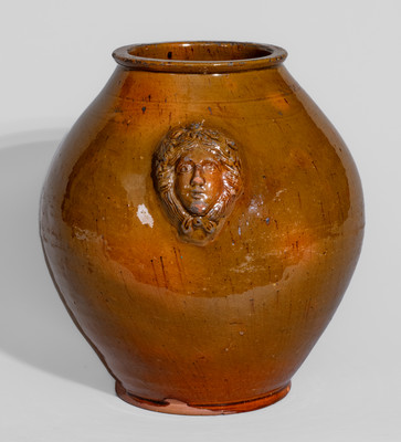 Rare and Fine Pennsylvania Redware Jar w/ Woman's Head Handles, 19th century