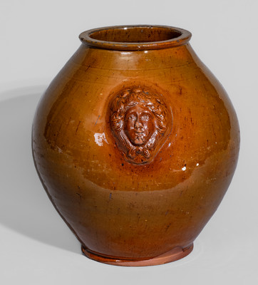 Rare and Fine Pennsylvania Redware Jar w/ Woman's Head Handles, 19th century