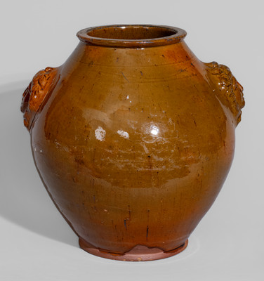 Rare and Fine Pennsylvania Redware Jar w/ Woman's Head Handles, 19th century