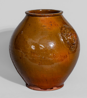 Rare and Fine Pennsylvania Redware Jar w/ Woman's Head Handles, 19th century