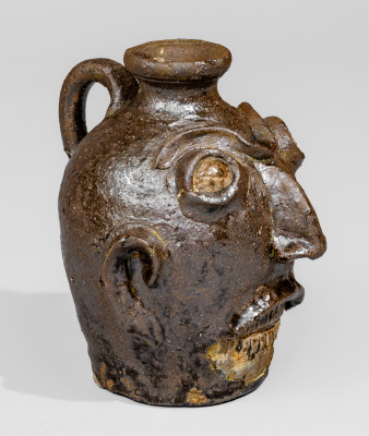 Rare Alkaline-Glazed Stoneware Face Jug with Glazed Kaolin Eyes and Teeth, Miles Mill Pottery, Edgefield District, South Carolina origin, circa 1870