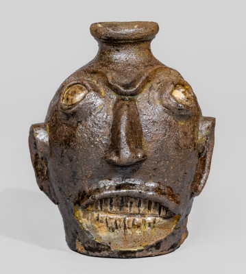 Rare Alkaline-Glazed Stoneware Face Jug with Glazed Kaolin Eyes and Teeth, Miles Mill Pottery, Edgefield District, South Carolina origin, circa 1870