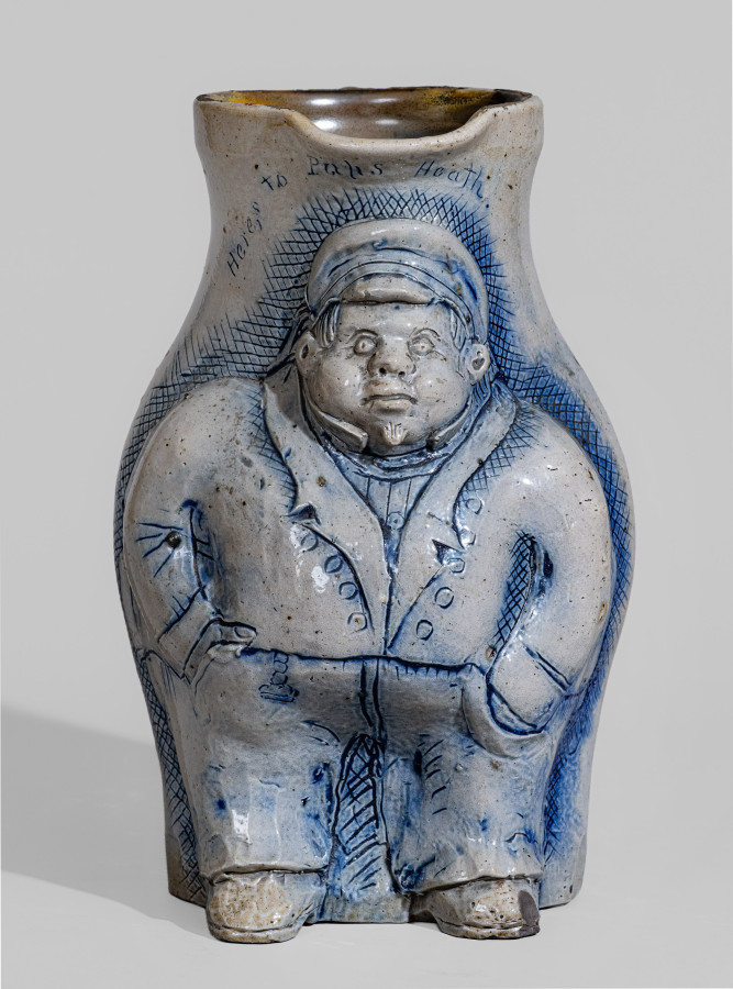 Important One-Gallon Cobalt-Decorated Stoneware Pitcher with Hand-Modeled Decoration of a Railroad Conductor, Incised 