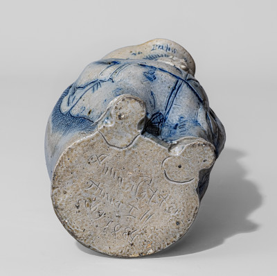 Important One-Gallon Cobalt-Decorated Stoneware Pitcher with Hand-Modeled Decoration of a Railroad Conductor, Incised 