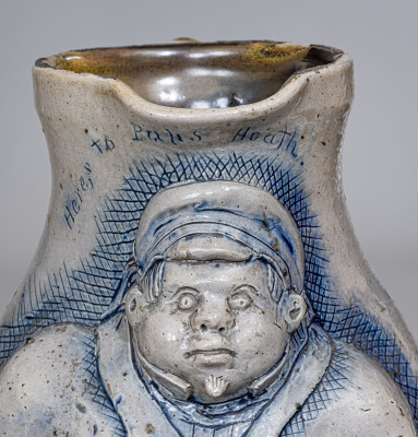 Important One-Gallon Cobalt-Decorated Stoneware Pitcher with Hand-Modeled Decoration of a Railroad Conductor, Incised 