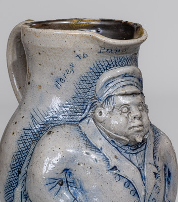 Important One-Gallon Cobalt-Decorated Stoneware Pitcher with Hand-Modeled Decoration of a Railroad Conductor, Incised 