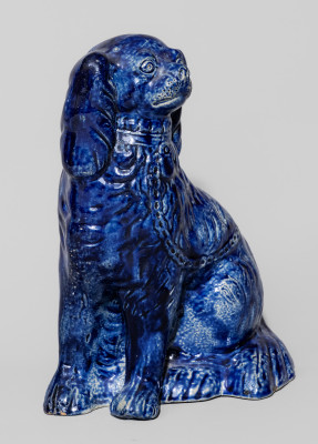 Exceptional Cobalt-Decorated Stoneware Spaniel Bank, New York State origin, circa 1860.