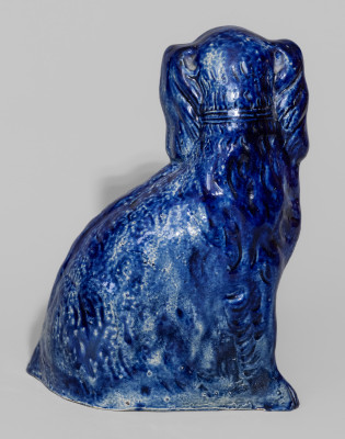 Exceptional Cobalt-Decorated Stoneware Spaniel Bank, New York State origin, circa 1860.