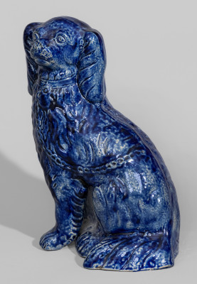 Exceptional Cobalt-Decorated Stoneware Spaniel Bank, New York State origin, circa 1860.
