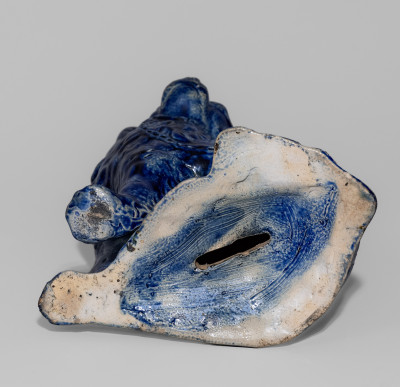 Exceptional Cobalt-Decorated Stoneware Spaniel Bank, New York State origin, circa 1860.