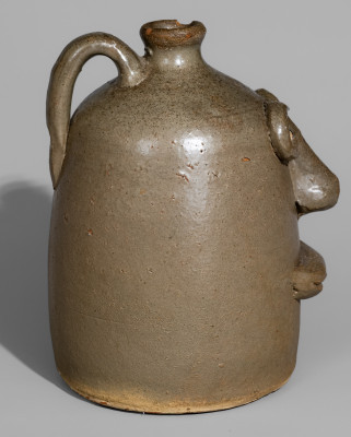 Very Rare Alkaline-Glazed Stoneware Face Jug with Rock Eyes, attributed to Lanier Meaders, Cleveland, GA, circa 1968.