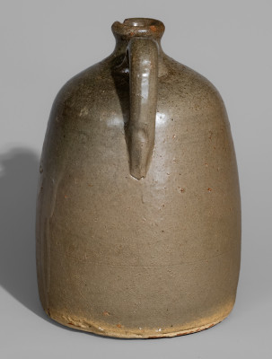 Very Rare Alkaline-Glazed Stoneware Face Jug with Rock Eyes, attributed to Lanier Meaders, Cleveland, GA, circa 1968.