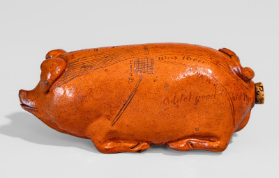 Lead-Glazed Redware Pig Bottle with Incised Map, attributed to Anna Pottery, third quarter 19th century.