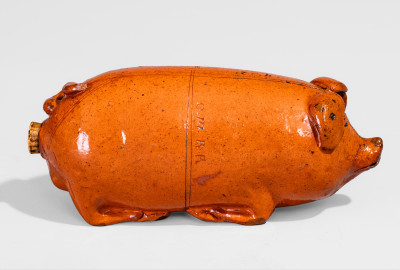 Lead-Glazed Redware Pig Bottle with Incised Map, attributed to Anna Pottery, third quarter 19th century.