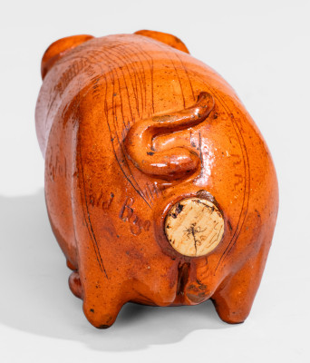 Lead-Glazed Redware Pig Bottle with Incised Map, attributed to Anna Pottery, third quarter 19th century.