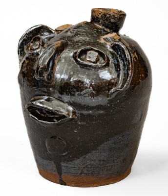 Rare Alkaline-Glazed Stoneware Face Harvest Jug, probably Upstate SC, late 19th / early 20th century