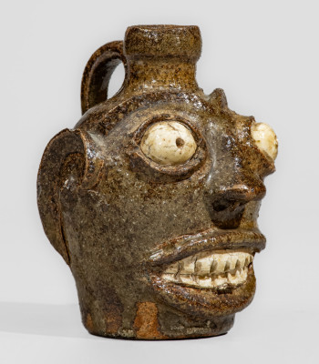 Rare and Fine Small-Sized Edgefield District, South Carolina Stoneware Face Jug w/ Kaolin Eyes and Teeth