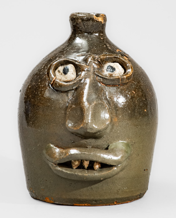 Important and Very Rare Early-Period Lanier Meaders Face Jug w/ Rock Eyes, late 1960 s