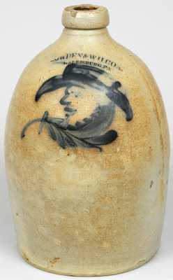 COWDEN & WILCOX / HARRISBURG, PA Stoneware Jug w/ Man-in-the-Moon Wearing a Hat