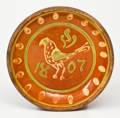 Exceptional Southeastern Pennsylvania Redware Dish with Two-Color Slip Bird Decoration, 1807