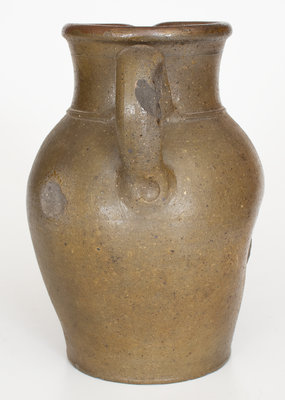 Midwestern Stoneware Pitcher with Incised Floral Decoration