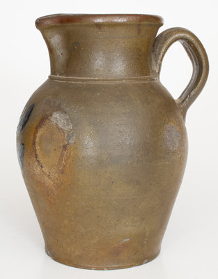 Midwestern Stoneware Pitcher with Incised Floral Decoration