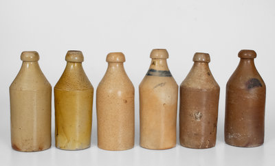 Lot of Six: Stoneware Bottles with Impressed Names