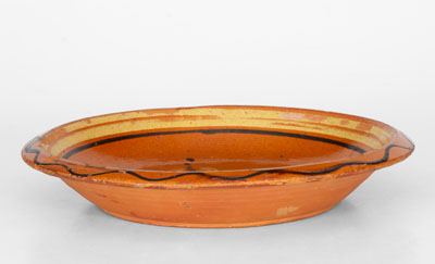 Fine Redware Bowl w/ Two-Color Slip Decoration, probably North Carolina, early 19th century